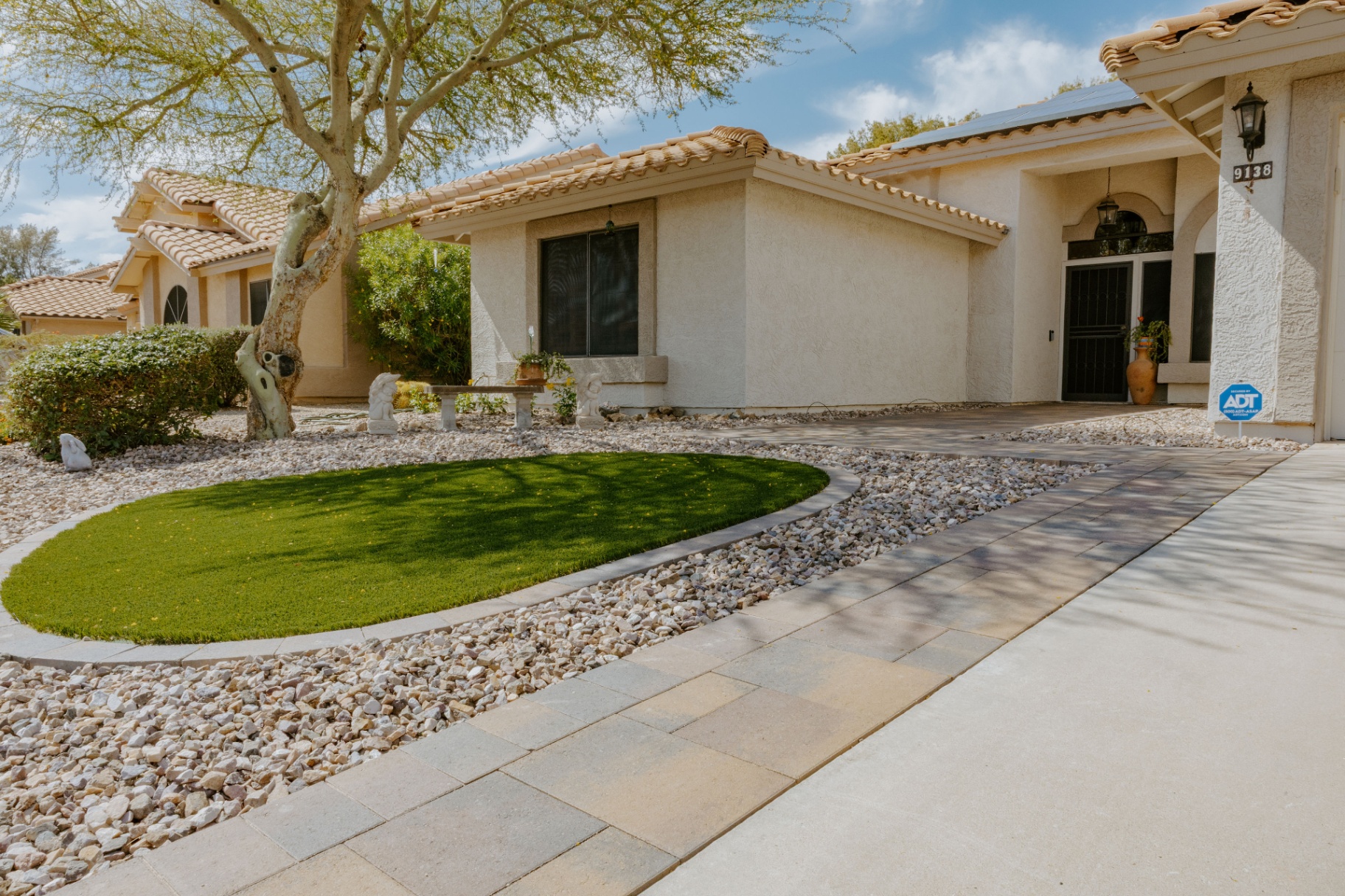 Front Yard Refresh · Turf & Pavers after